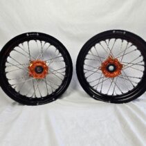 KTM65 2025 forward 12" wheels built with Orange Haan hubs and Dubya spokes